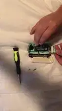 Use <a href="../../home/unavailable_offline?url=/products/tweezers" class="product-link">tweezers</a> to lift the ZL button a little then pull upwards to get it back into place.
