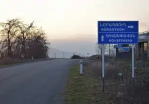 A sign reading "Noragyugh" and "Hovsepavan" in Armenian