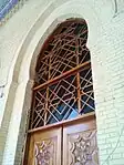 Ornate wooden door in the Mosque.