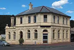 Former bank at 112 Main Street Zeehan. It was constructed by the Commercial Bank of Tasmania and opened in 1899. It was merged into the English, Scottish and Australian Bank in 1921 and the ANZ Bank in 1970, but the branch was closed by ANZ in late 2016.