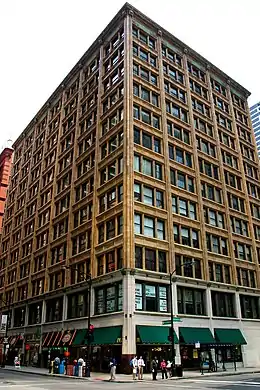 A photograph of a corner of the Brooks Building, from the northwest direction, on July 12, 2010, by J. Crocker