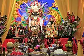 An altar dedicated to various gods at a temple in Tainan.