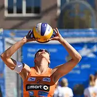 Image 1A player hand sets the ball (from Beach volleyball)