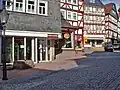 View of Westheimer Straße with two rediscovered examples of Homberg's historical water supply