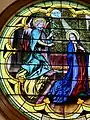 Close up of the forward-most stain glass window, depicting the Annunciation.