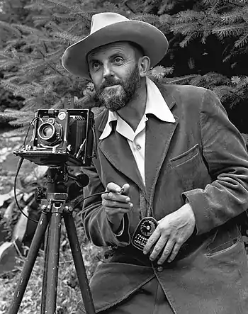 Ansel Adams and camera, photograph by J. Malcolm Greany