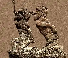 Prisoners of Anubanini, brought by Goddess Ishtar (detail). They are naked, their hands bound, and held by a ring through the nose.