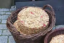 Apple pressings in a wooden basket