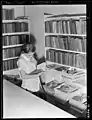 The Library at the Arvin Federal Government Camp with a staffed WPA Librarian.