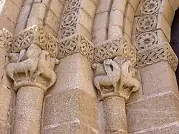 The portal of the Hermitage of St Segundo, Avila, has paired creatures. and decorative bands of floral and interlacing. The pairing of creatures could draw on Byzantine and Celtic models.