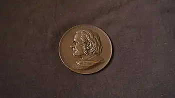 The Huxley memorial medallion in bronze created by Frank Boucher