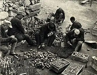 Chinese workers producing copies of the M24 by hand.