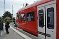 Train at buffer stop, station Uetliberg. Low floor door.