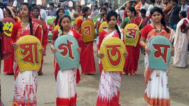 Children in Bangladesh carrying placards in Pohela Boishakh's rally