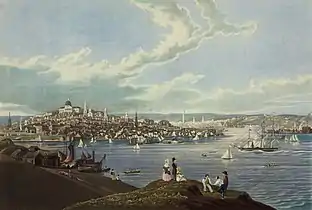 Painting with a body of water with sailing ships in the foreground and a city in the background