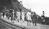 Chittaranjan Das with cane in hand, and  Mahatma Gandhi on the Hill Cart Road near Kakjhora, Darjeeling in 1925