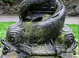 Victorian cast iron lamp post base, in front of the museum.