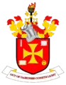 Arms of City of Wolverhampton Council with a stalked fire basket in the crest