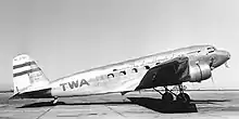 TWA DC-2 airplane parked on airport's concrete apron