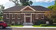 A Carnegie Library made of brown bricks