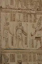 Roman emperor as pharaoh making offerings to Isis and Osiris