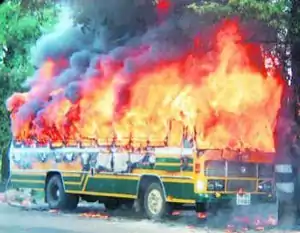 The bus, fully engulfed in flames