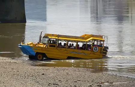 Image 3Duck tour converted DUKW amphibious vehicle exiting the River Thames.