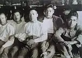 Tsuburaya (far right) sits with Imperial Japanese Army pals in the 1920s