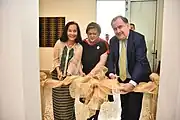 Lacanlale (left), Lazaro (center) and Rozencwaig (right) cut the ribbon to formally inaugurate the new chancery