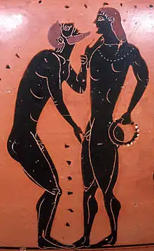 Image 29Traditional pederastic courtship scene on an Athenian black-figure amphora from the 5th century B.C.