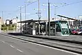 Trambesòs stop with a tram towards Glòries