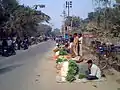 Evening vegetable bazaar along Court Road