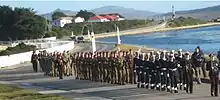 Line of soldiers near water