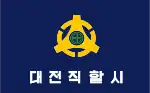 Former flag of Daejeon, South Korea (1972-1995) contains small green sun cross in the centre