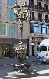 Font de Canaletes (1892), by Pere Falqués, Rambla amb la Plaça de Catalunya.