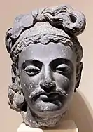 Head of a Bodhisattva, said to reproduce the Kushan princely types seen in Khalchayan. Philadelphia Museum of Art