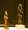 Figure of a girl with a cat and standing figure of a young woman, 18th Dynasty, c. 1380 and 19. Dynasty, Abusir el Meleq and Thebes