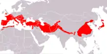 From North Africa and southern Europe through south-west Asia, the Caucasus, Iran, Afghanistan, Pakistan and the Himalayas to south-eastern China, Korea, and Japan