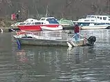 The ferry running empty from the south to north bank to collect passengers