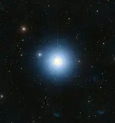 A large blue star in an ocean of other stars taken by telescope