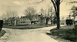 Driveway branching to three two-story buildings