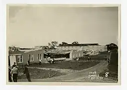 Buildings damaged by trees felled by the tornado