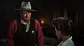 John Wayne in battered slouch hat and more authentic costume