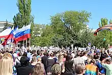 Local residents in Crimea at «Immortal regiment», carrying portraits of their ancestors and participants in World War II, 9 May 2016.