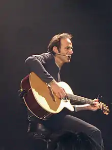 Goldman in 2002 at Le Zénith in Paris