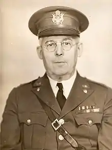 Black and white head and shoulders portrait of Brigadier General John E. Woodward in dress uniform and cap, circa 1920