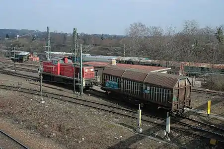 A switcher locomotive pushing a car over the hump at Kornwestheim yard.