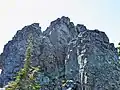 Looking up at the east side Lane Peak's summit block