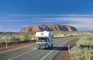 Driving on the Lasseter Highway near the Uluru-Kata Tjuta National Park in the Northern Territory.