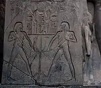 Low relief within a sunk outline, linear sunk relief in the hieroglyphs, and high relief (right), from Luxor